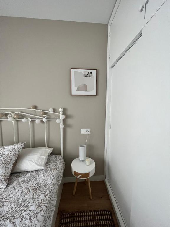 Postel nebo postele na pokoji v ubytování Sanxenxo a un minuto playa vistas y Garage 8pax