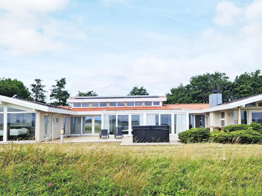 an exterior view of a house with large windows at Holiday home Haderslev XXVI in Haderslev