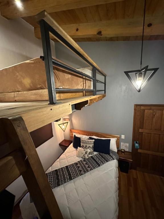 Postel nebo postele na pokoji v ubytování Hotel Kali