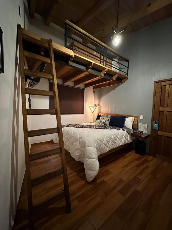Postel nebo postele na pokoji v ubytování Hotel Kali
