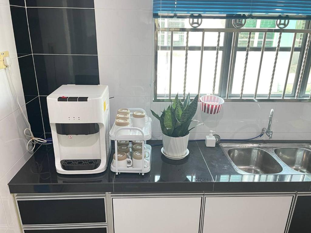 Kuchyň nebo kuchyňský kout v ubytování JJ&KK Homestay