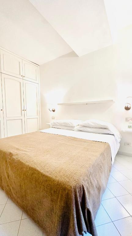 Postel nebo postele na pokoji v ubytování Villa La Zagara by CapriRooms