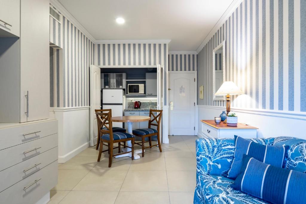 Kuchyň nebo kuchyňský kout v ubytování Hotel Villa Morra Suites