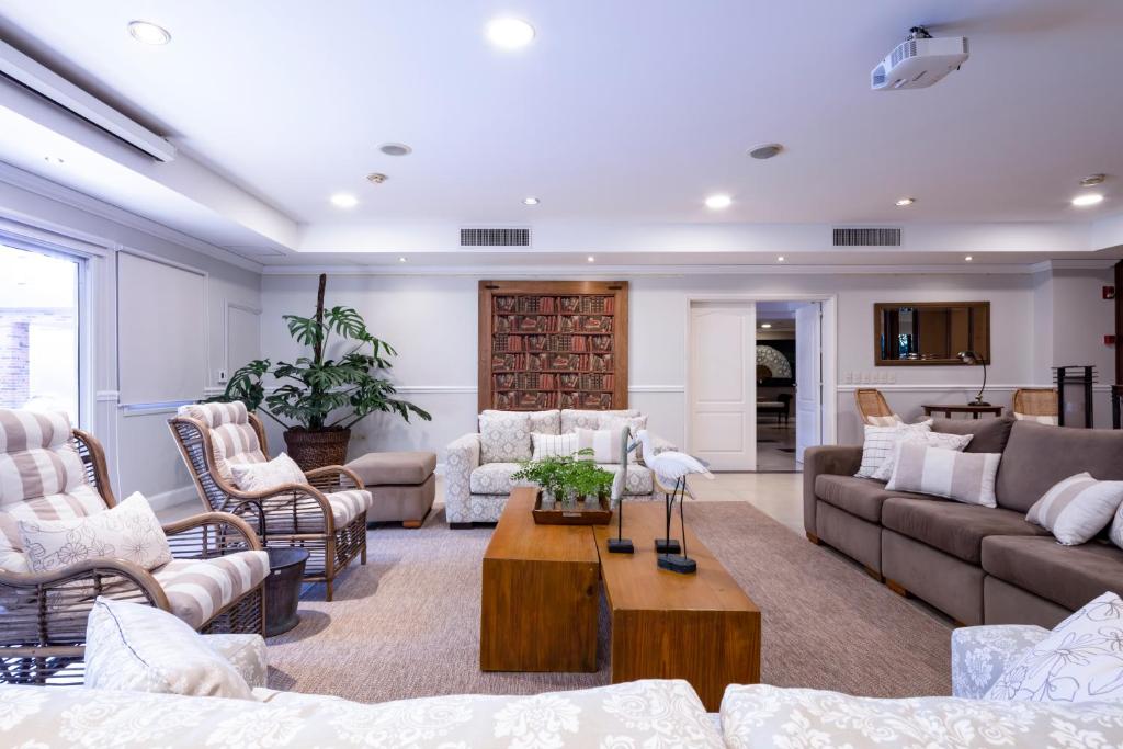 Posezení v ubytování Hotel Villa Morra Suites