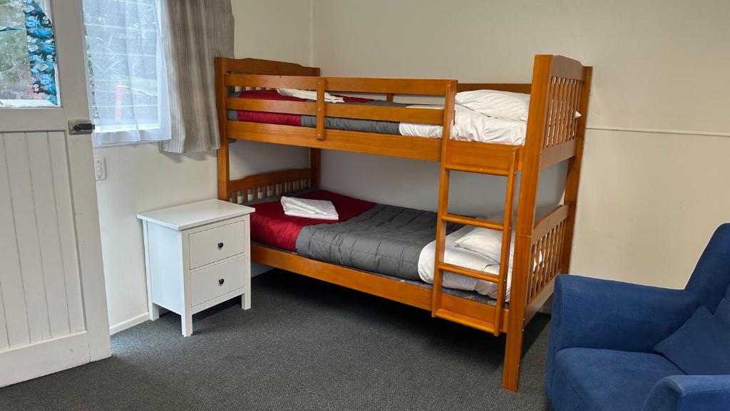 Postel nebo postele na pokoji v ubytování Touchwood Motor Inn & Inner City Camping Ground