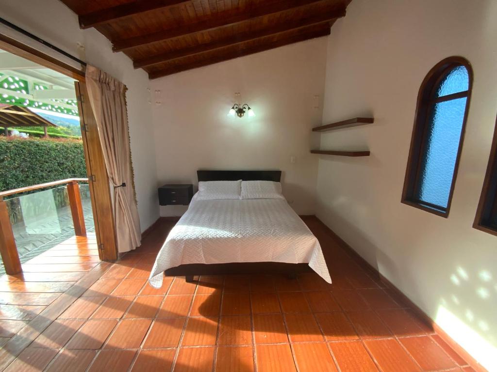 Postel nebo postele na pokoji v ubytování Finca Hotel 12 Palmas- Aeropuerto JMC