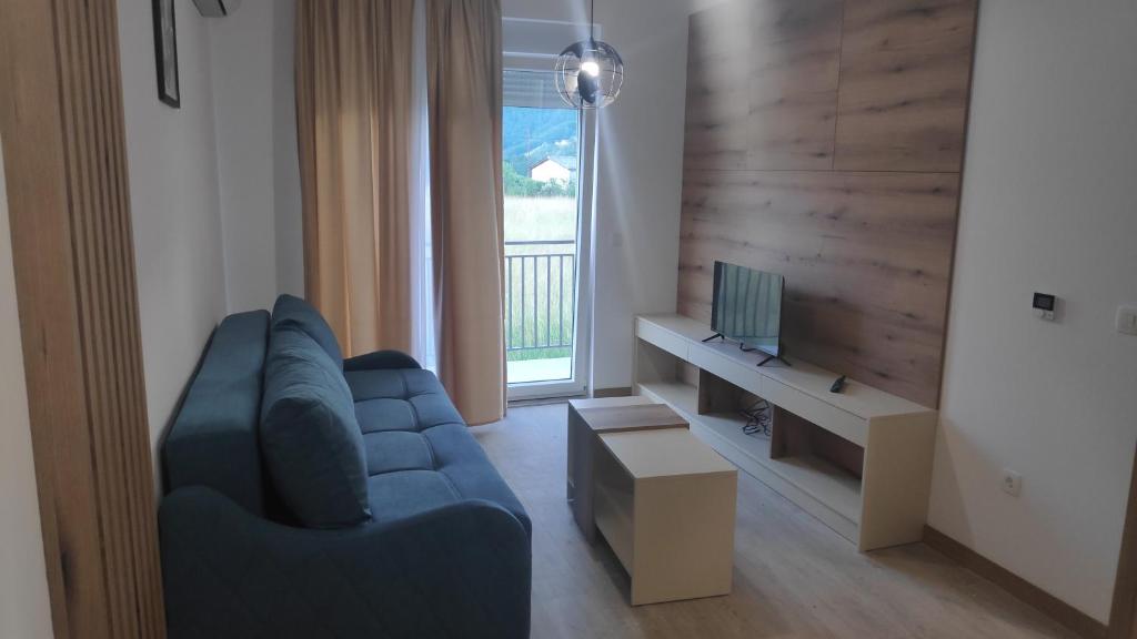 TV a/nebo společenská místnost v ubytování Pini Apart-hotel