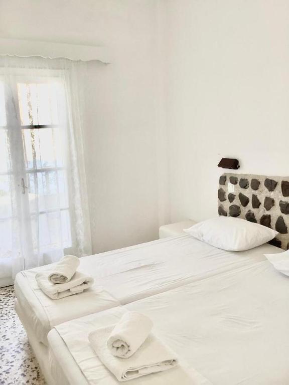Postel nebo postele na pokoji v ubytování Villa Maina