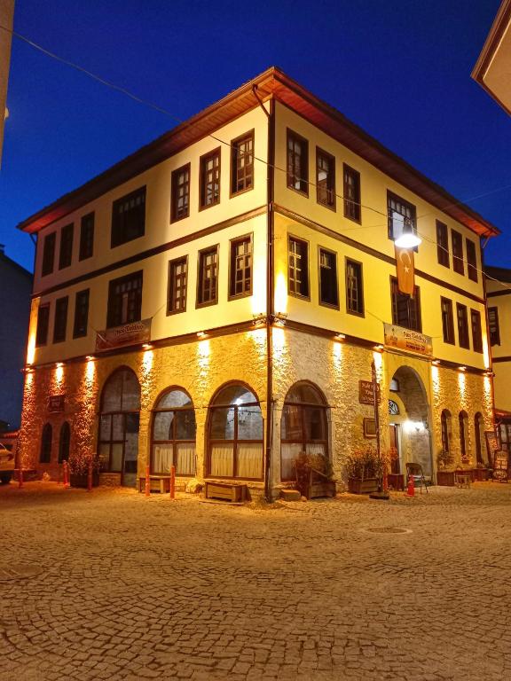 a large building with lights on the side of it at Muhsin Bey Konağı in Safranbolu