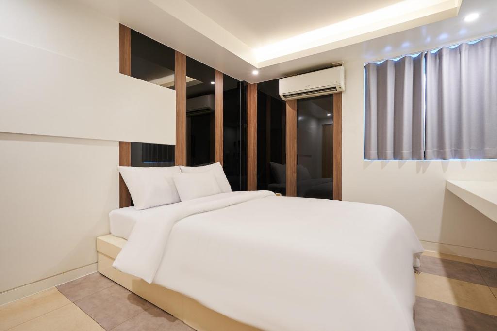 Postel nebo postele na pokoji v ubytování Show Hotel
