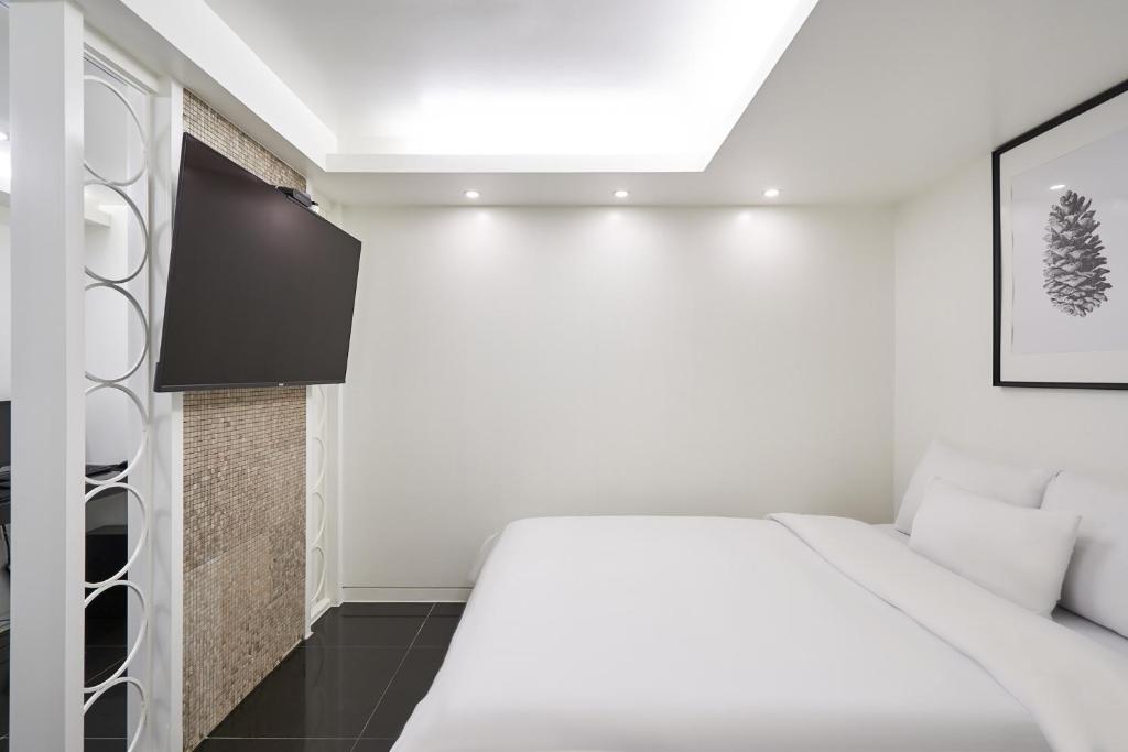 Postel nebo postele na pokoji v ubytování Show Hotel