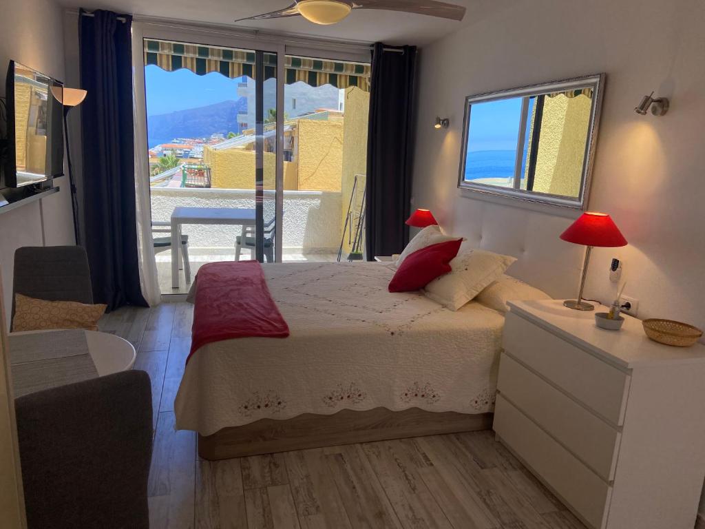 A bed or beds in a room at Estudio Vistamar La Arena