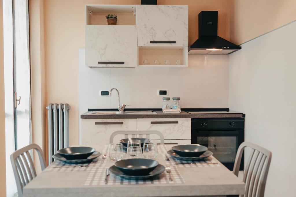 Kjøkken eller kjøkkenkrok på Casa Calandri - Elegante Appartamento Free Wi-FI