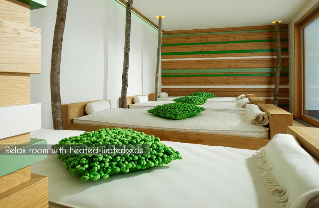 Postel nebo postele na pokoji v ubytování Aspen Alpine Lifestyle Hotel