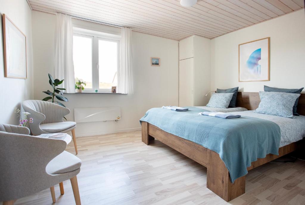 Postel nebo postele na pokoji v ubytování Stone Mountain BnB