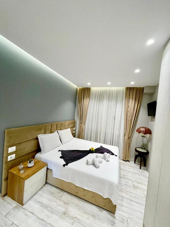 Postel nebo postele na pokoji v ubytování Alb Apartments