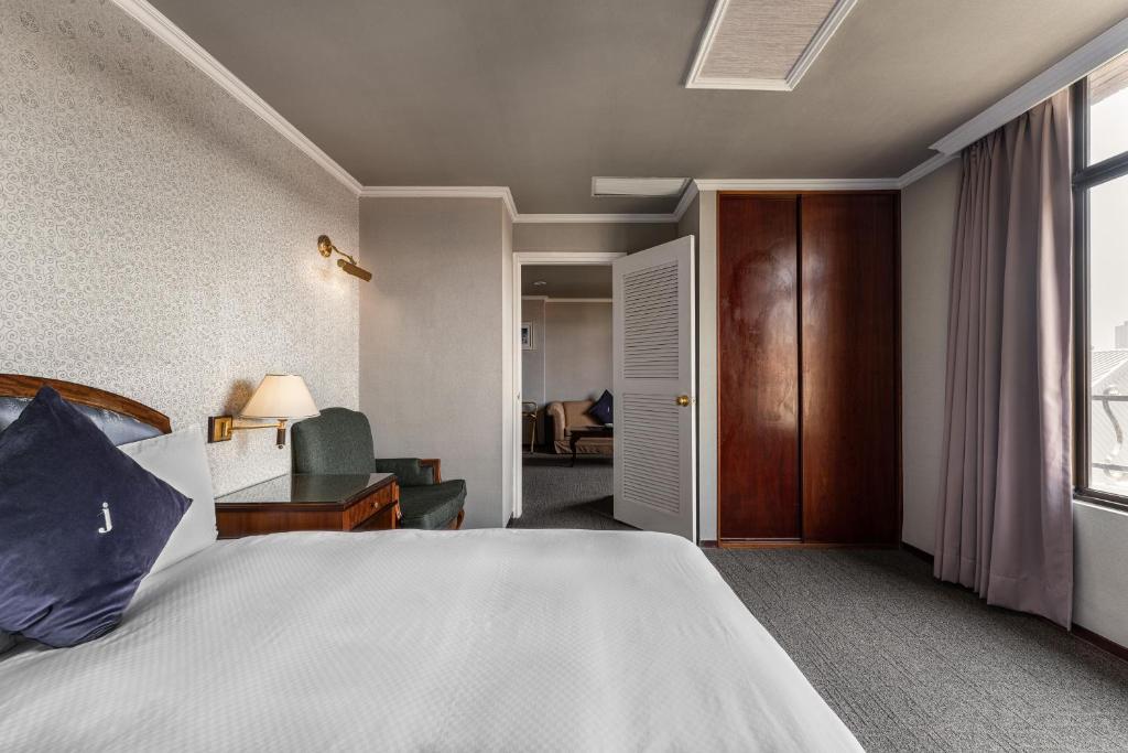 Postel nebo postele na pokoji v ubytování Hotel j-Metropolis