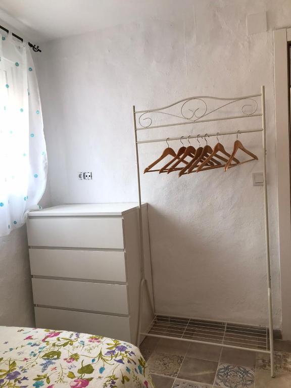 Postel nebo postele na pokoji v ubytování APARTAMENTOS LOLITALOLA HOLIDAYS