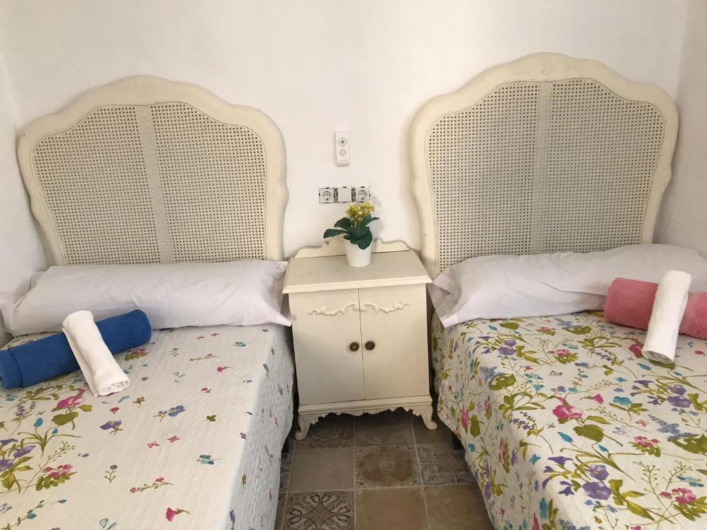 Postel nebo postele na pokoji v ubytování APARTAMENTOS LOLITALOLA HOLIDAYS