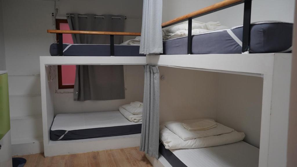 Palanda nebo palandy na pokoji v ubytování Hannahstay Women Only Guesthouse