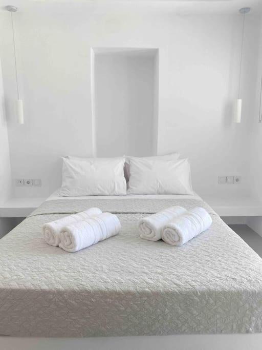 Postel nebo postele na pokoji v ubytování 31 Seafront Apartment
