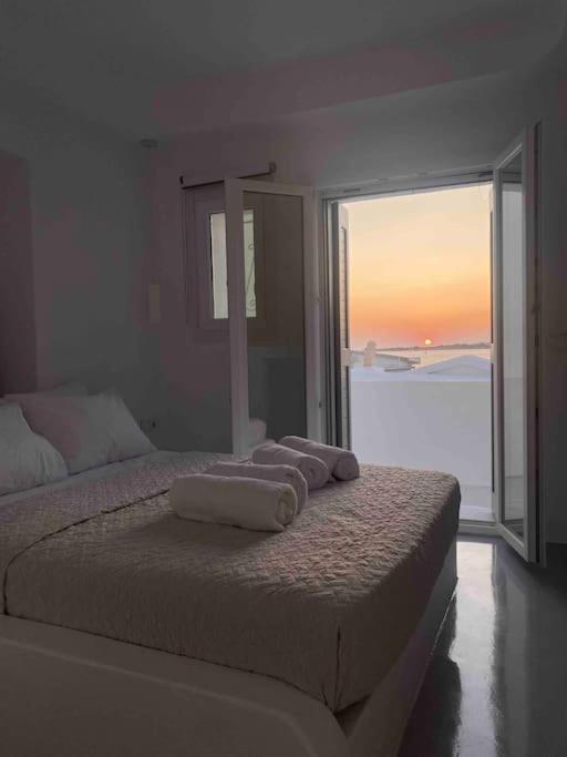 Postel nebo postele na pokoji v ubytování 31 Seafront Apartment