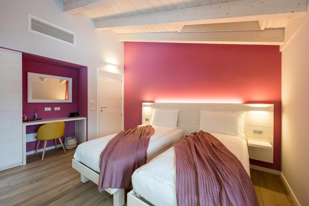 Postel nebo postele na pokoji v ubytování Bianco Hotel