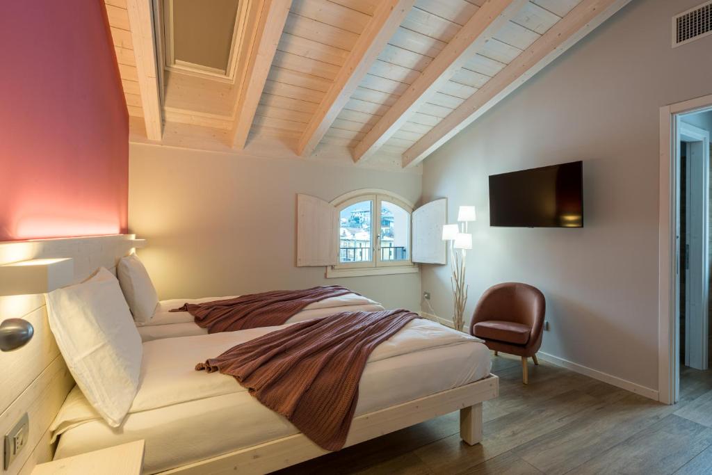 Postel nebo postele na pokoji v ubytování Bianco Hotel