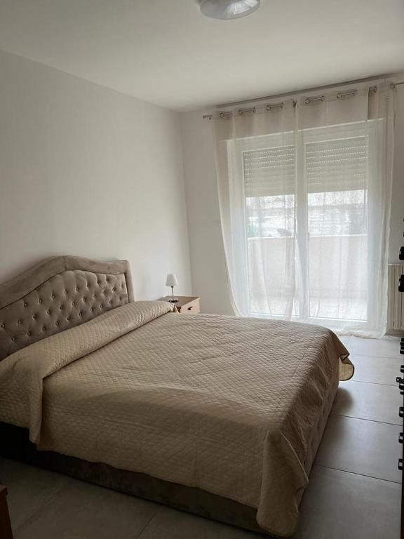 Postel nebo postele na pokoji v ubytování Roby Seahouse