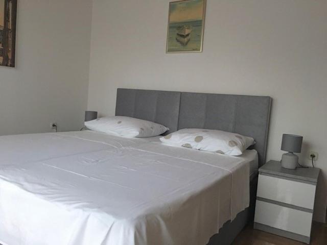 Postel nebo postele na pokoji v ubytování Apartment Nela