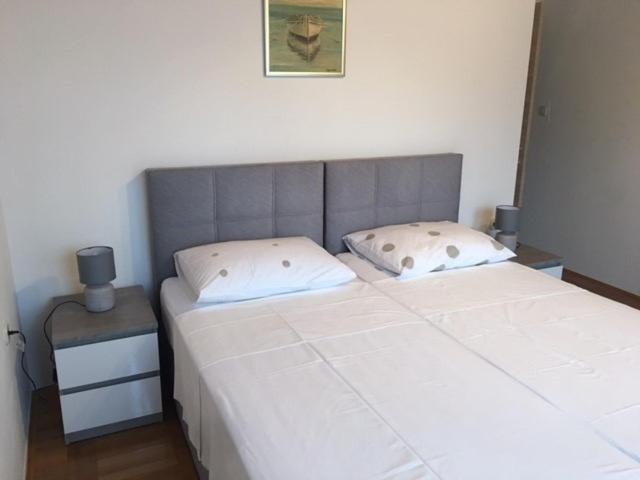 Postel nebo postele na pokoji v ubytování Apartment Nela