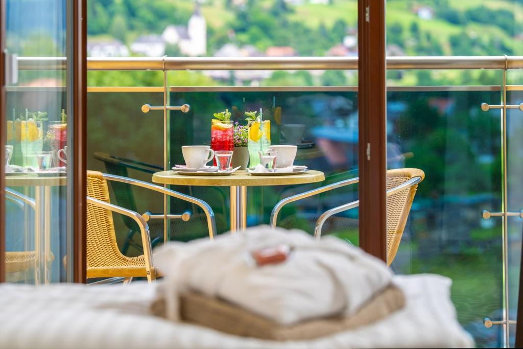 A balcony or terrace at Relax Resort Hotel Kreischberg