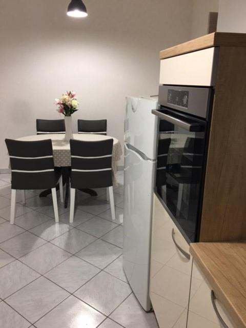 Kuchyň nebo kuchyňský kout v ubytování Apartment Nela