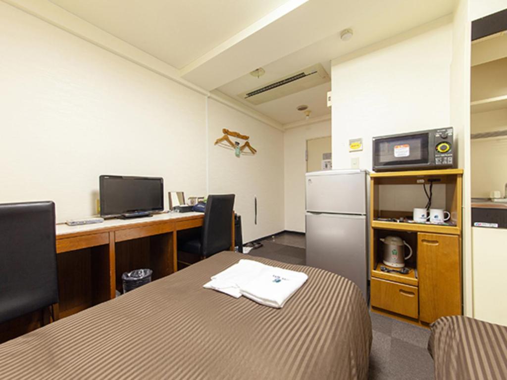 Kuchyň nebo kuchyňský kout v ubytování HOTEL LiVEMAX BUDGET Nippori