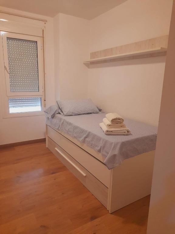 Posteľ alebo postele v izbe v ubytovaní Apartamento Fabricio