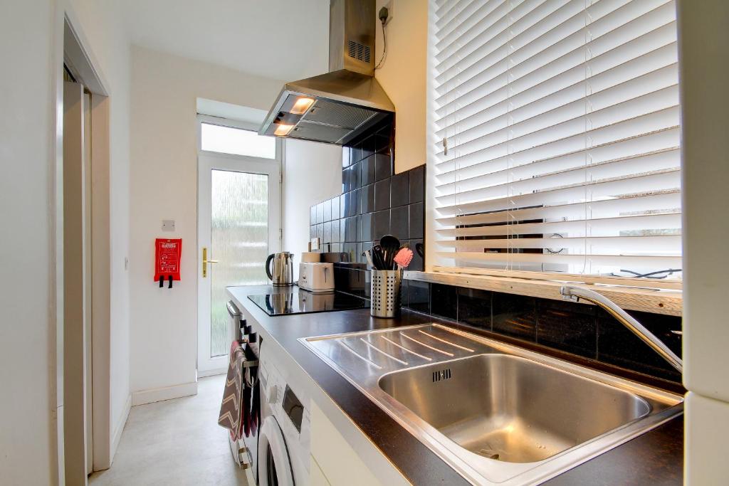 Kuchyň nebo kuchyňský kout v ubytování Apartment Caerlaverock Road