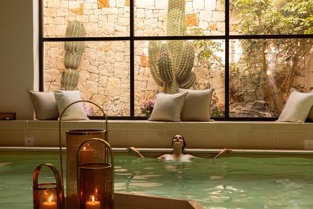 Bazén v ubytování Masseria Bandino & Spa nebo v jeho okolí