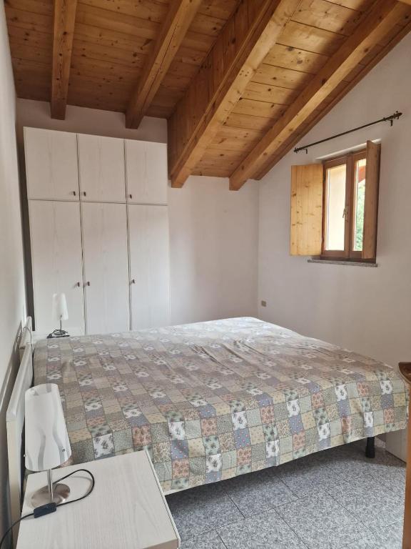 Postel nebo postele na pokoji v ubytování Giò Appartamenti Vacanze