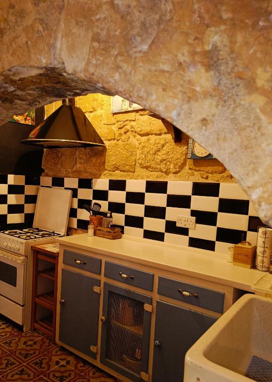 Kuchyň nebo kuchyňský kout v ubytování Fusion Homestay Accommodation