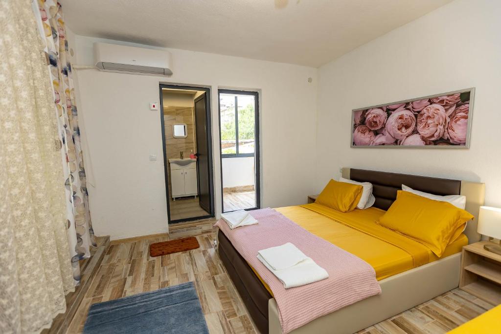 Postel nebo postele na pokoji v ubytování APARTEMENT VIVA