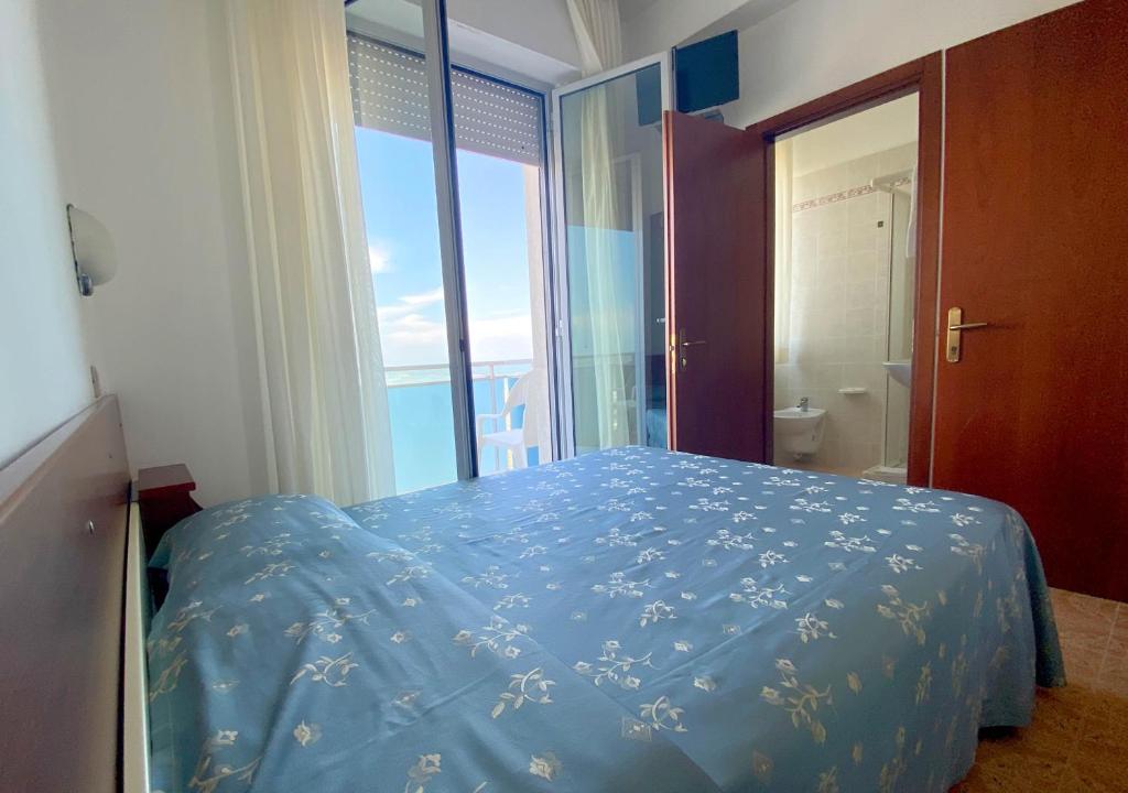 Кровать или кровати в номере Hotel Sayonara