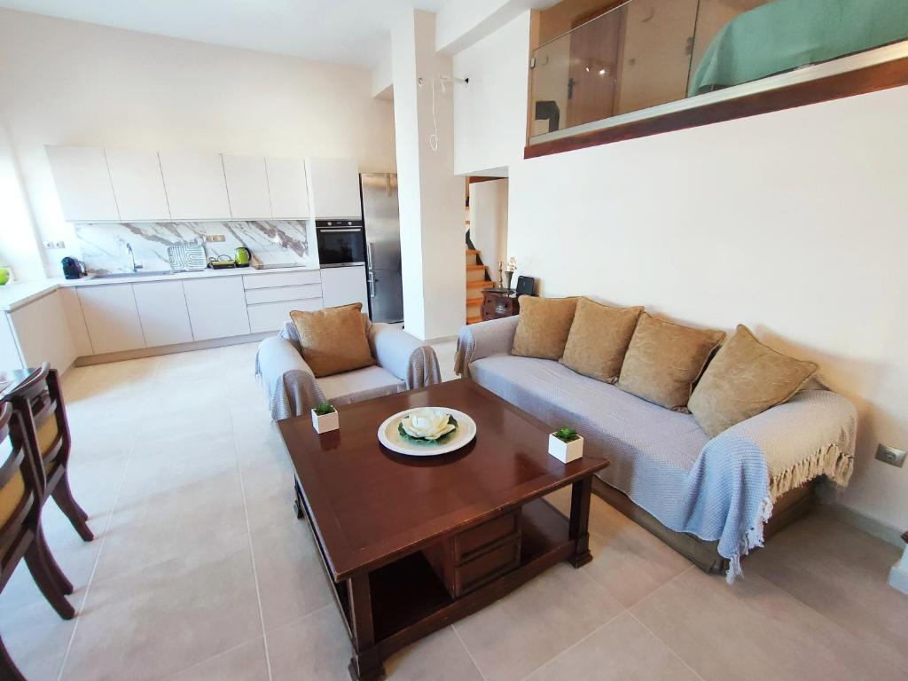 Kuchyň nebo kuchyňský kout v ubytování Avramiou Lofts