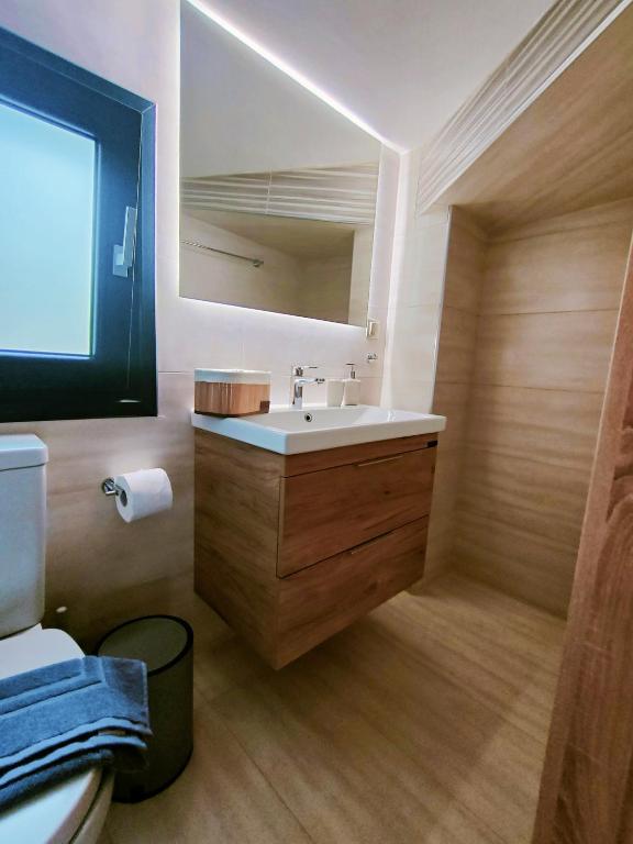 Koupelna v ubytování Avramiou Lofts