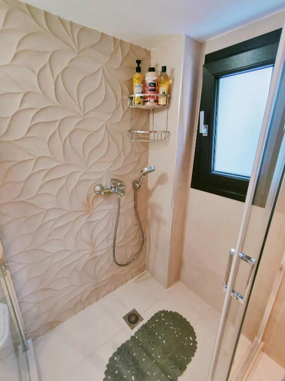 Koupelna v ubytování Avramiou Lofts