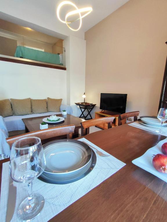 TV a/nebo společenská místnost v ubytování Avramiou Lofts