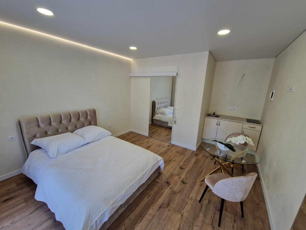Кровать или кровати в номере 2rest