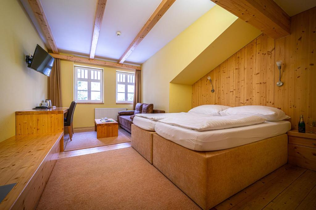 Postel nebo postele na pokoji v ubytování Hotel Sepetná