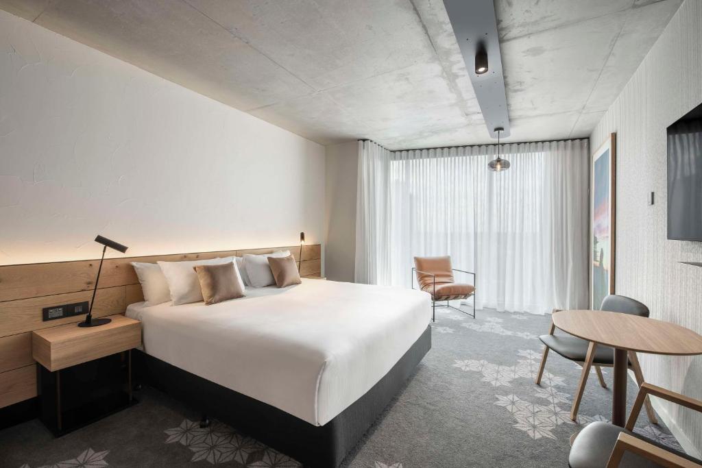 Postel nebo postele na pokoji v ubytování Vibe Hotel Adelaide