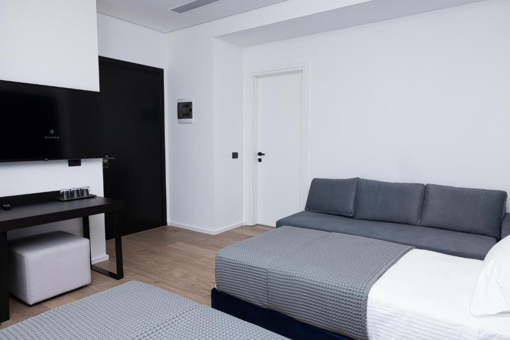 TV a/nebo společenská místnost v ubytování Lans Hotel