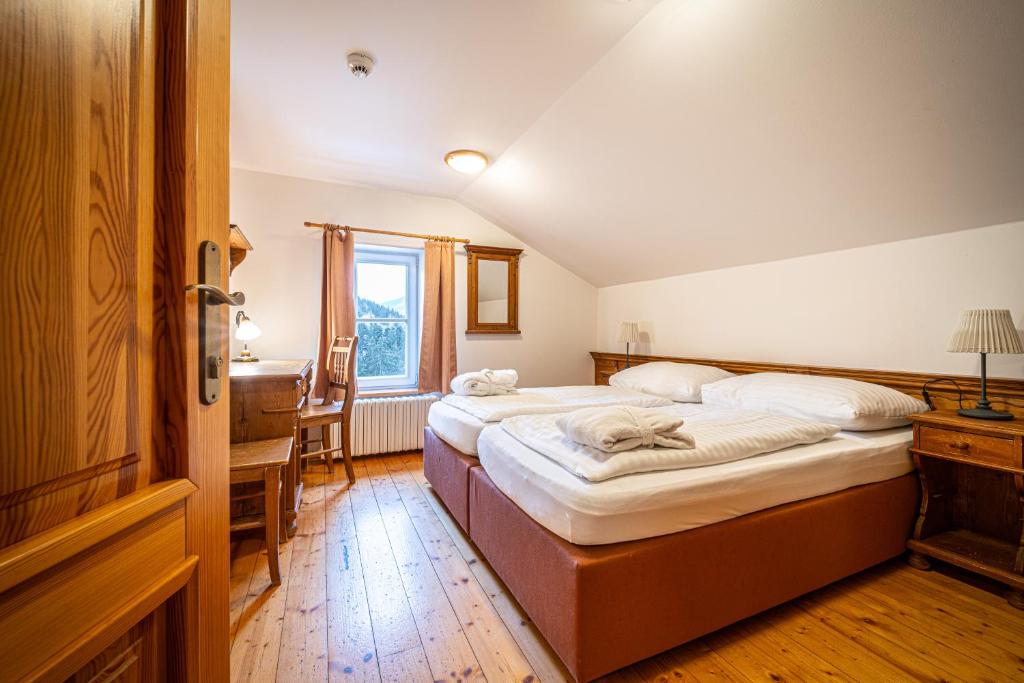 Postel nebo postele na pokoji v ubytování Hotel Sepetná